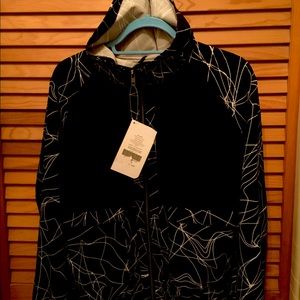 Hooded warm up jacket by Fabletics.